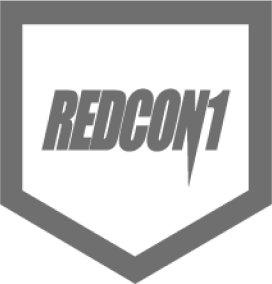 Alt text: Redcon1 logo in black text with a chevron below on a white background, supplements company icon